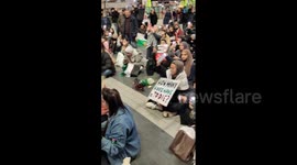 UK: Pro-Palestine Supporters Stage Sit-In Protest At Birmingham New Street Station 2