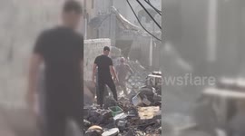 Father Grieves For Children Buried In Rubble After Air Raid in al-Bureij camp, Gaza