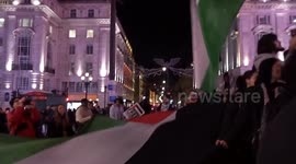 We Will Keep Marching - promises speaker at pro-Palestine protest and vigil in London - Piccadilly Circus