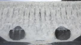 Caban Coch dam at Elan Valley overflows, following heavy rain.