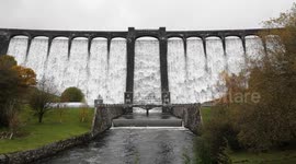 Claerwen dam at Elan Valley overflows, following heavy rain.