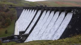 Claerwen dam overflows at Elan Valley, UK, following heavy rain.