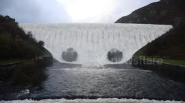 Caban Coch dam at Elan Valley overflows, following heavy rain.