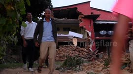 Locals inspect damage as Nepalese village decimated by deadly earthquake