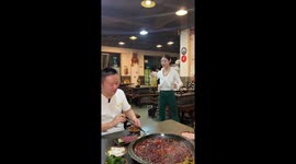 Waitress moves like a robot to entertain customers in China