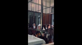 Cloistered Carmelite nun plays guitar and sings for loved ones visiting her