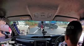 Lucky Thai driver cheats death when truck spins out-of-control and stops right in front of him