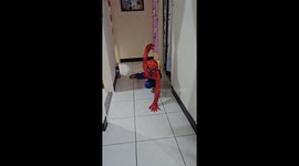 this little boy plays Spiderman,he is ready for Halloween