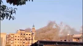 Cloud of dust and smoke rises near the Indonesian hospital in Gaza, as offensive intensifies