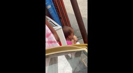 Toddler has a sweet moment alone with pet cat