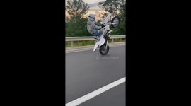 Motorbike wheelie on public road goes wrong