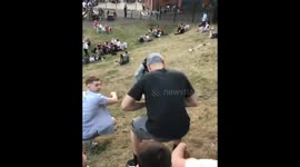 Man riding kid's scooter down steep hill gets AIR