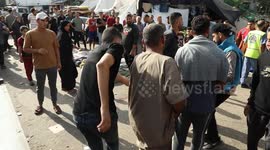 Martyrs are being held in a funeral procession at Al-Shifa Hospital in Gaza City