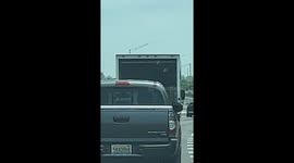 Open Door On A Moving Van