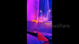 Cable narrowly misses vehicles following snap from China's newly inaugurated bridge