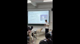 Pet cats and dogs wander through university class helping students to relax