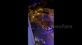 Police and protesters clash outside Socialist Party HQ over Catalan amnesty law