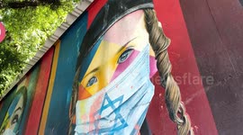 Mural symbolising Israel is vandalised with red paint in Sao Paulo