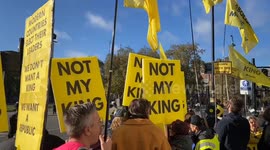 Anti-monarchy protesters boo and chant ‘Not my king’ as King Charles III arrives at Parliament