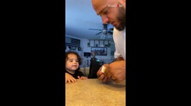 'Did you eat it?' - Man asks his toddler granddaughter to wait for him to eat candy bar