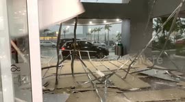 Dramatic footage as mall's drywall is ripped off just inches from woman and child in Sao Paulo