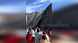 Tourists narrowly escape terrifying landslide's path in China
