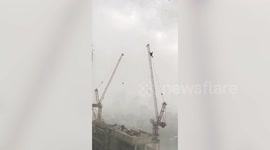 Rags fly through the air during storm in Bangkok