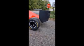 Motor racing fanatic drives restored F1 car on roads in France