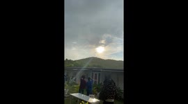 Awestruck residents cheer as they witness rare 'dancing sun' phenomenon