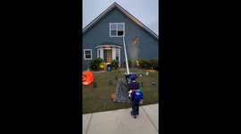 Man set up a slide from his 2nd-floor window to distribute Halloween treats