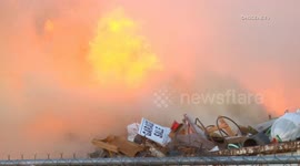 Santa Ana winds fuel intense pallet yard fire in Crestline, California