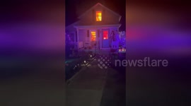 The roof is on fire? Realistic Halloween decorations draw concerned neighbors calling 911 in New York