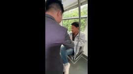 Beaming newlyweds hand out gifts to strangers on train in China