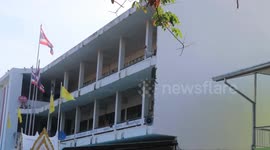 Aggressive wild monkey sparks panic climbing school buildings in Thailand