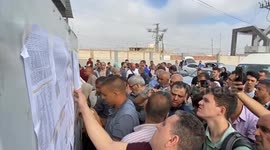 Gaza war: Desperate foreign citizens scan list of those allowed to flee via Rafah Crossing