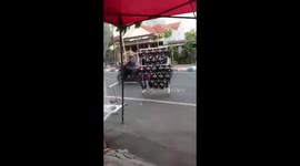 Runaway shoe rack hurtles into busy road in Mojokerto, Indonesia, amid high winds