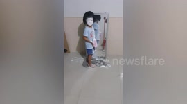 Toddler looks like 'The Grudge' ghost wearing face full of white powder