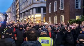 Olympiacos football fans takeover Piccadilly Circus ahead of clash against West Ham
