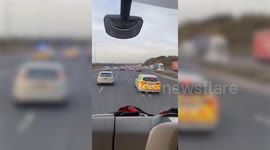 Dramatic footage shows police ramming BMW on motorway