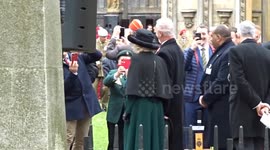 A glimpse of Queen Camilla greeting veterans at Westminster Abbey Field of Remembrance
