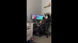 This dad has mastered parenting: Multitasking father plays Fortnite whilst daughter watches TV
