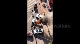 Heroic delivery men rescue driver from blazing car explosion in China