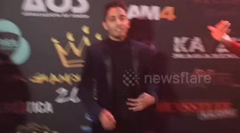 At the UK Glamour awards a magician shows of a handy trick with a lighter