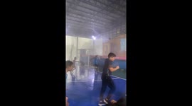 Pupils and teachers scream as severe storm batters school in Thailand