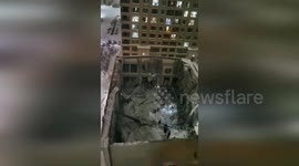 Rescuers search for survivors in collapsed school gym in China