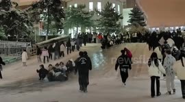 Snow transforms campus slope into makeshift 'ski resort' for students in northern China