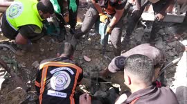 Rescue workers desperately try to locate survivors after Gaza's al-Shaboura was struck