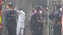 Firefighters battle blaze at a factory in Karachi, Pakistan