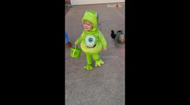 Toddler steals hearts on Halloween in his Mike Wazowski Costume