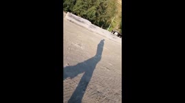 Spectral Stroll: Ghostly Figure Haunts the Moonlit Seashore area